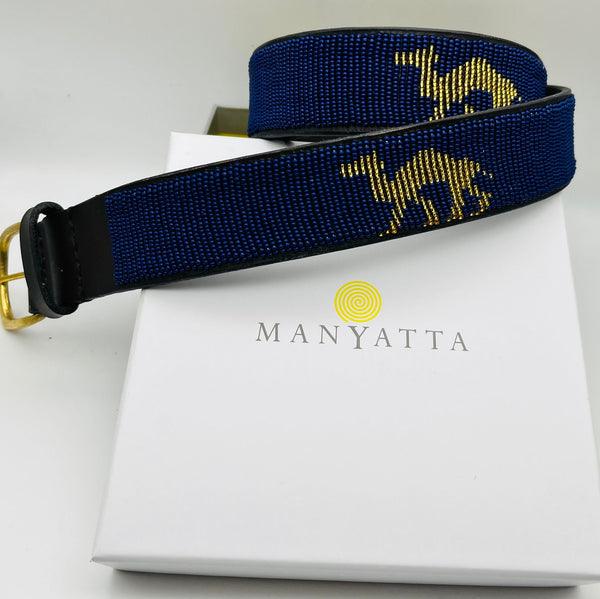 Gold camel with a navy blue background